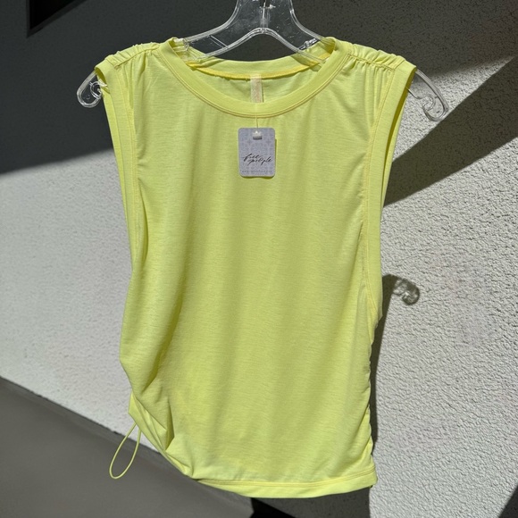 FREE‎ PEOPLE MOVEMENT yellow workout top NWT - Picture 1 of 8